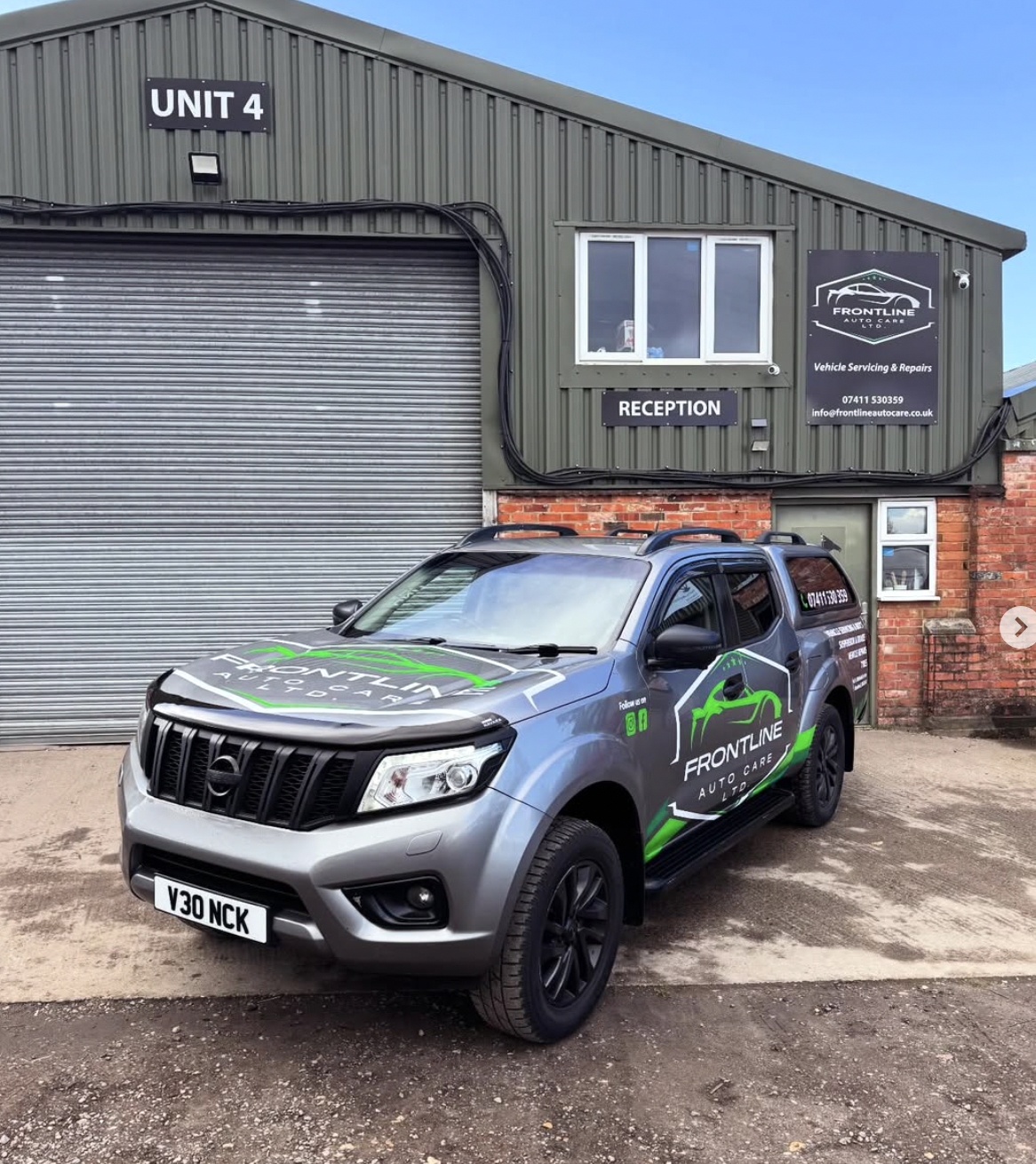 Frontline Autocare's branded pickup outside the Unit 4 workshop in Warfield